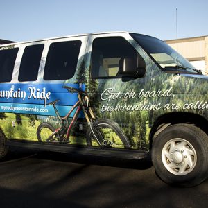 advertise on the road with vehicle wraps